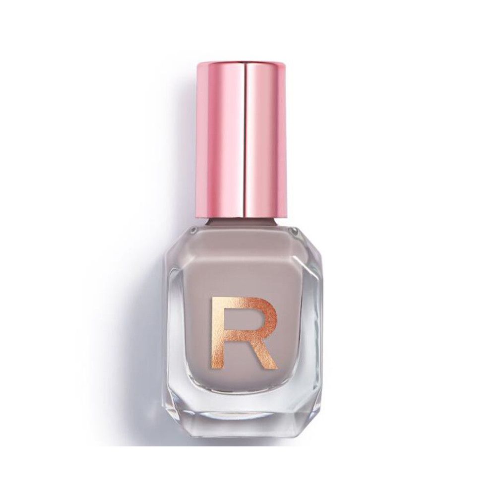 Glanzende nagellakfles met roségouden dop. Transparante fles met "R"-logo.