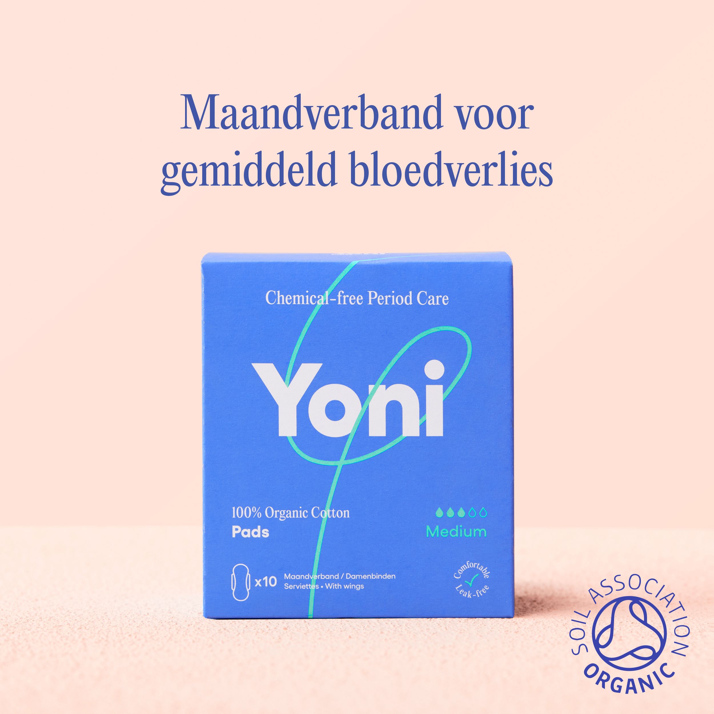 Blauwe doos met "Yoni" logo, tekst en Soil Association logo.
