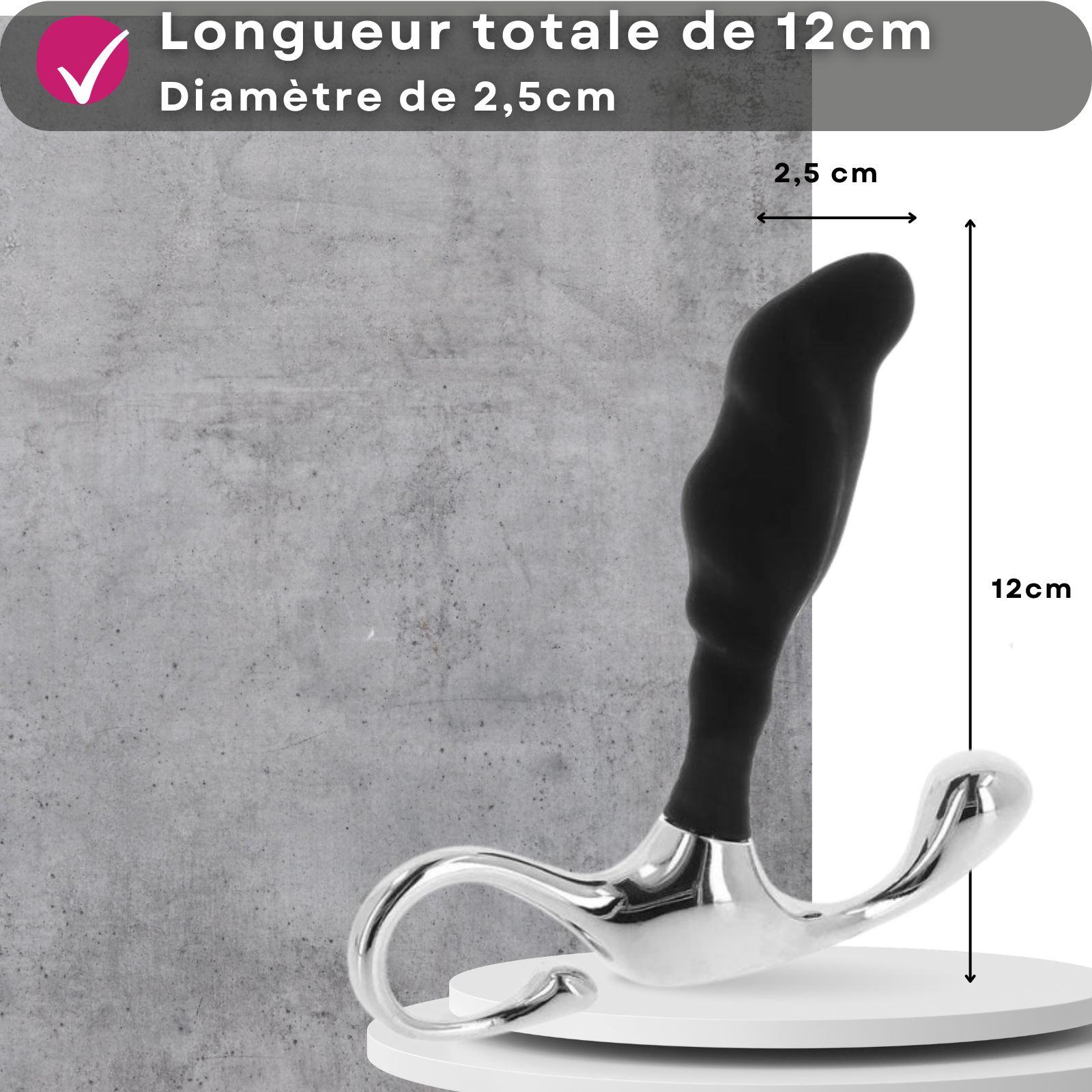 Vibrateur noir avec manche argenté, longueur 12 cm, diamètre 2,5 cm.