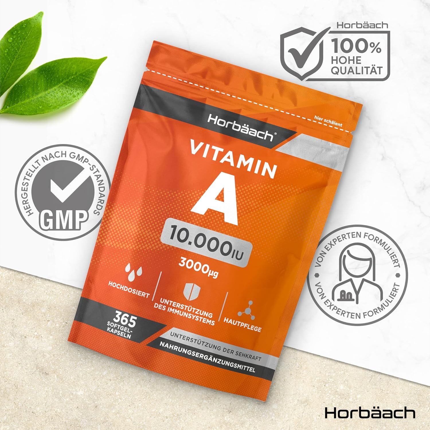 Oranje verpakking met vitamine A 10.000 IE capsules. Tekst: Hoog gedoseerd, ondersteuning immuunsysteem, huidverzorging, 365 softgel capsules. GMP-zegel.