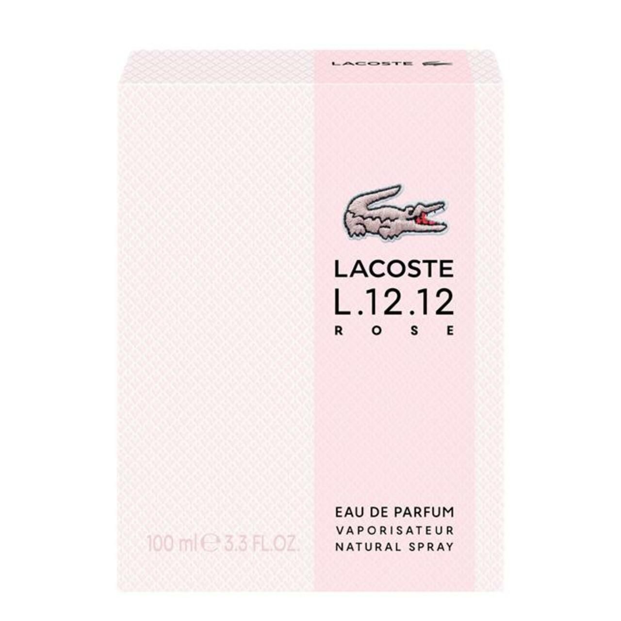 Roze verpakking met logo en tekst. Eau de Parfum. Lacoste L.12.12 Rose. Witte achtergrond.
