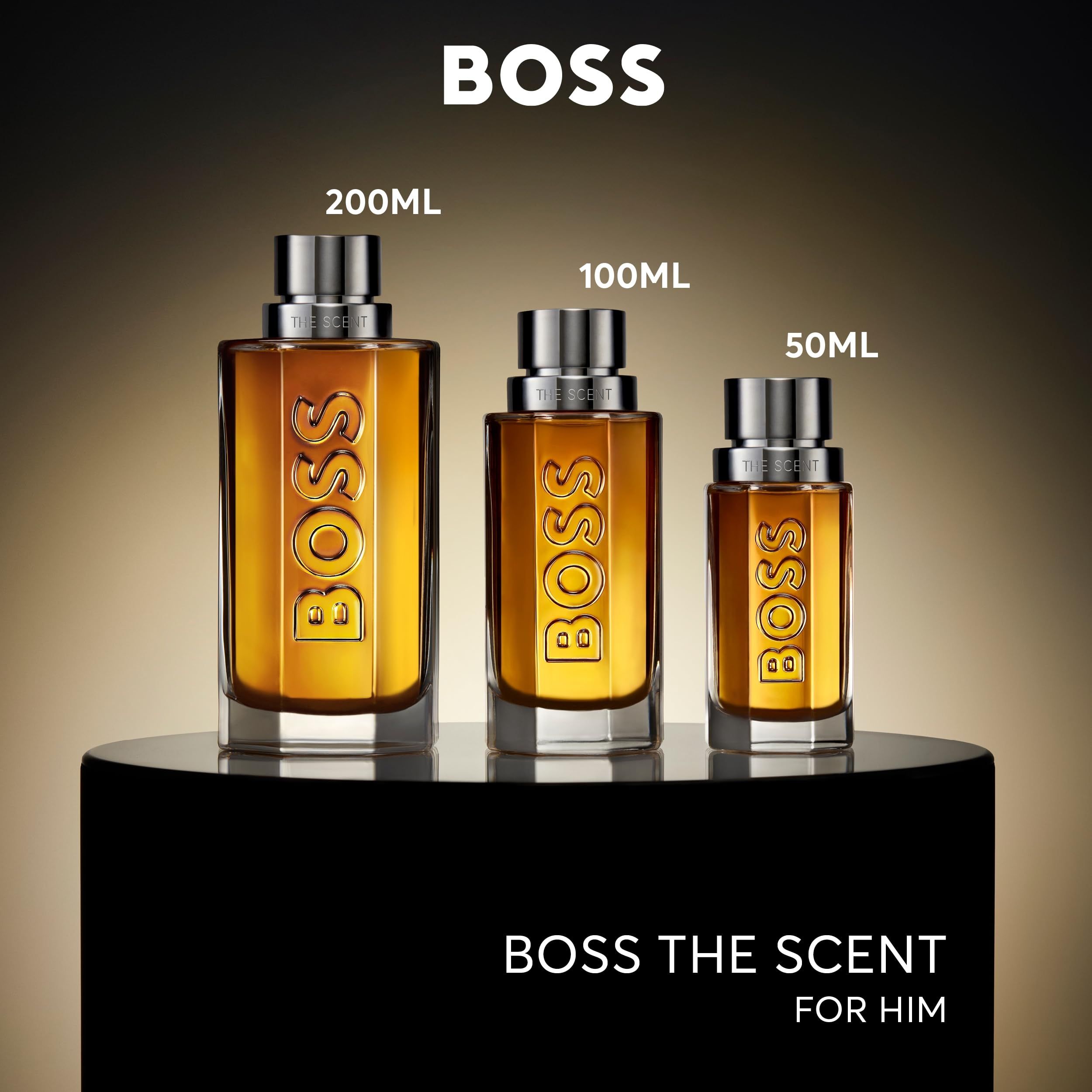 Drie flacons Hugo Boss The Scent Eau de Parfum in maten 200ml, 100ml, 50ml.