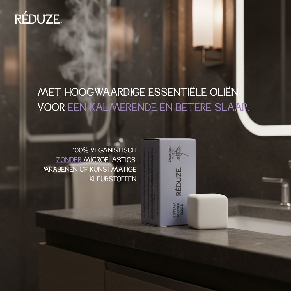 Een doos en een doucheblokje. Op de doos staat RÉDUZE. 100% vegan, zonder microplastics.