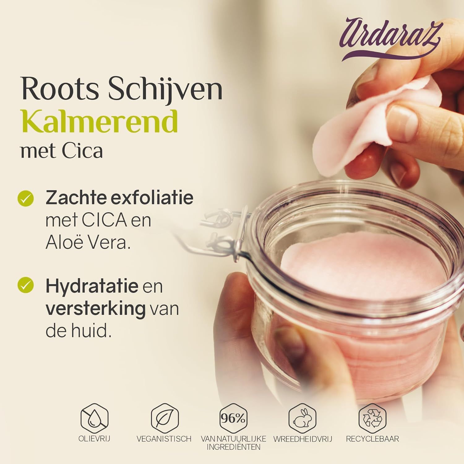 Glazen pot met roze wattenschijfjes, met opschrift 'Roots Schijven Kalmerend met Cica'.