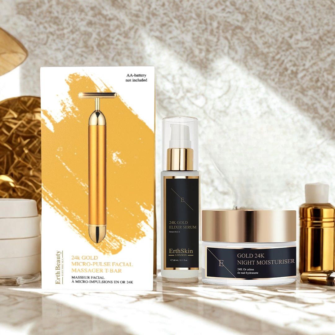 Ensemble ErthSkin London. Masseur en T 24K, sérum et crème. Masseur doré, flacon de sérum et pot de crème. Bouteille supplémentaire.