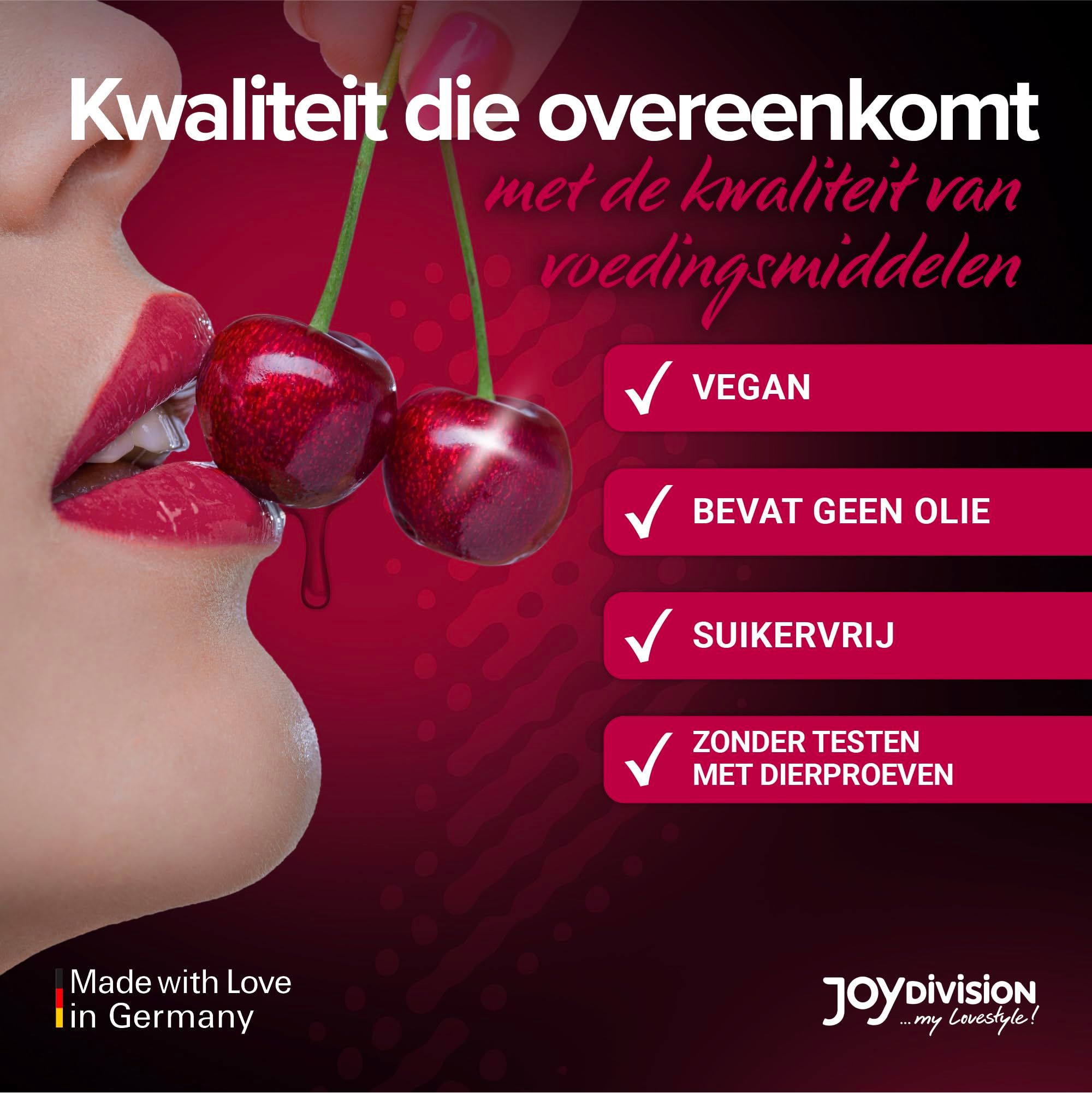 Fles kersenmassageolie, met kersen en spatten.