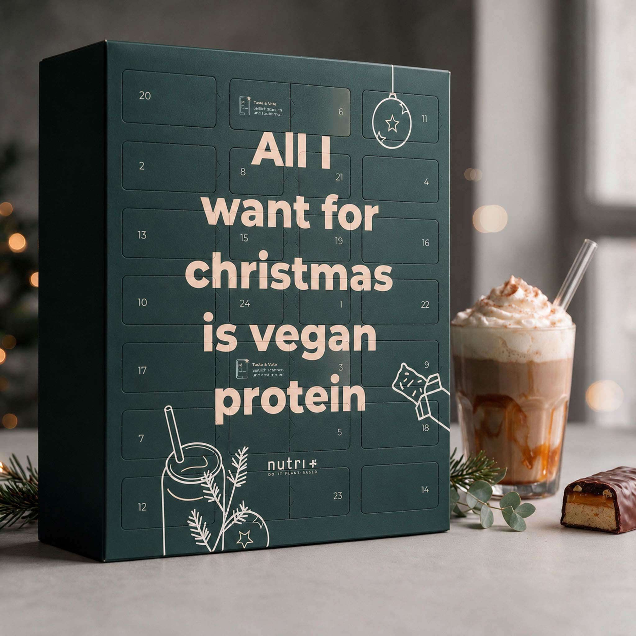 Calendrier de l'Avent vert foncé avec l'inscription « All I want for christmas is vegan protein » et le logo « nutri+ ».