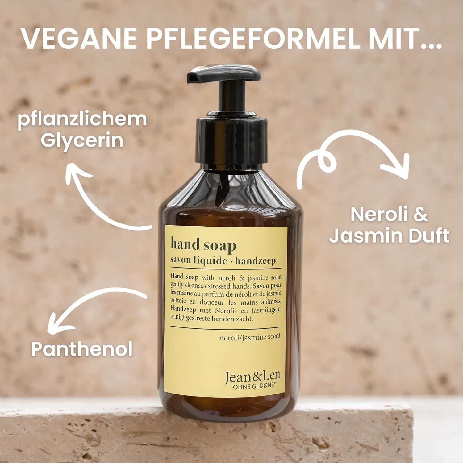 Bruine fles handzeep met zwarte pomp. Opschrift: Hand Soap, Neroli & Jasmin geur, Jean & Len.