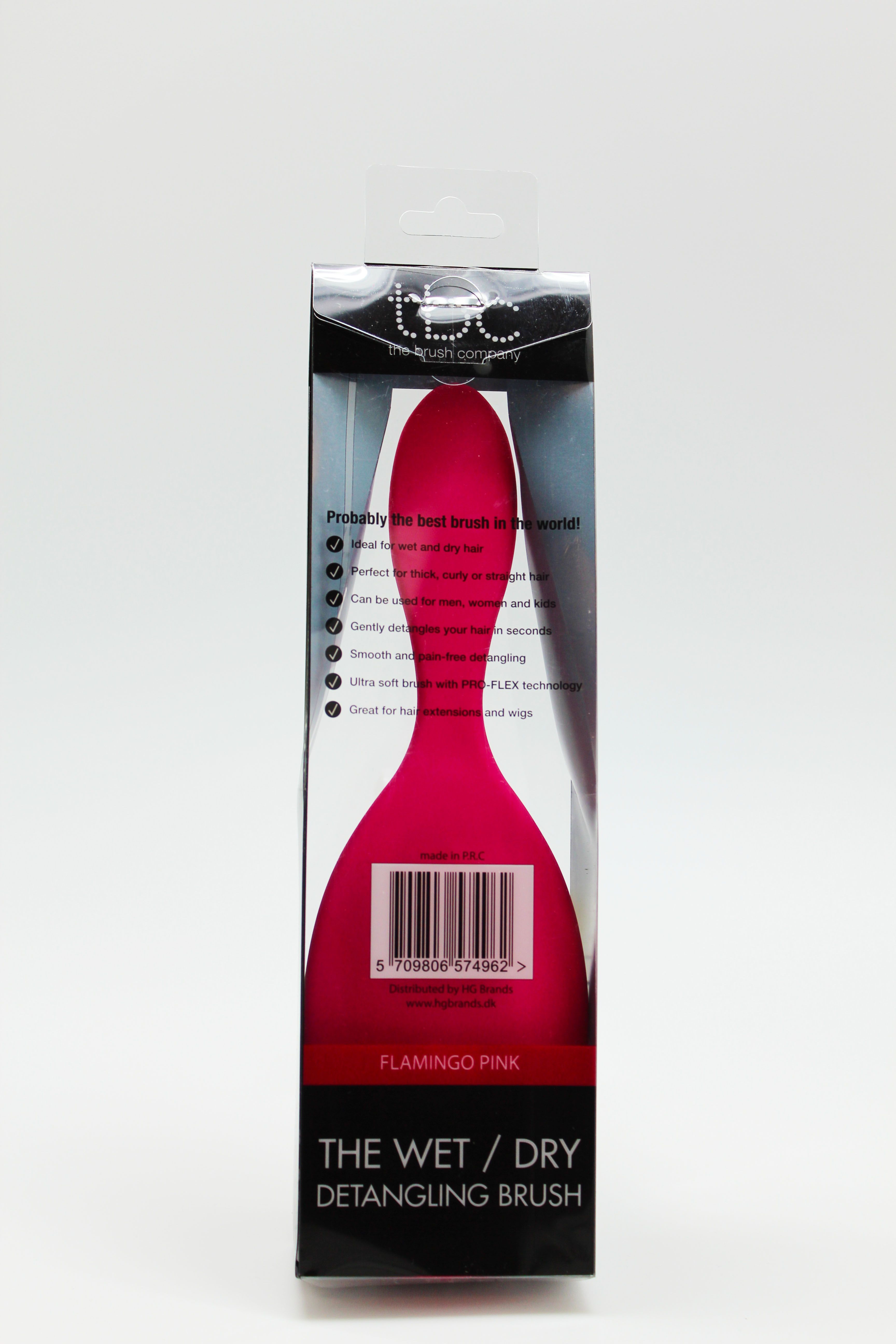 Achterkant van de TBC Detangling Haarborstel Flamingo Roze in verpakking, met barcode en productkenmerken.