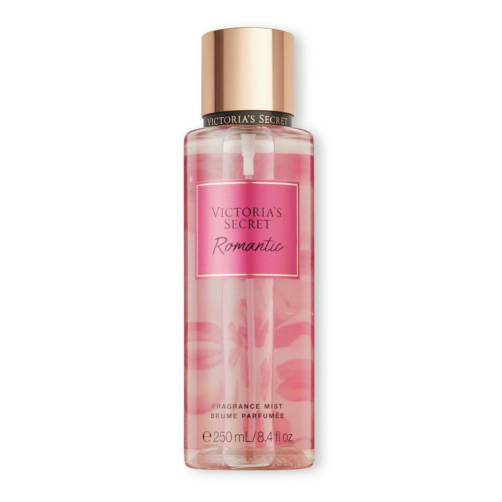 Flacon rose avec vaporisateur. Étiquette "Victoria's Secret Romantic". Texte : "Fragrance Mist".