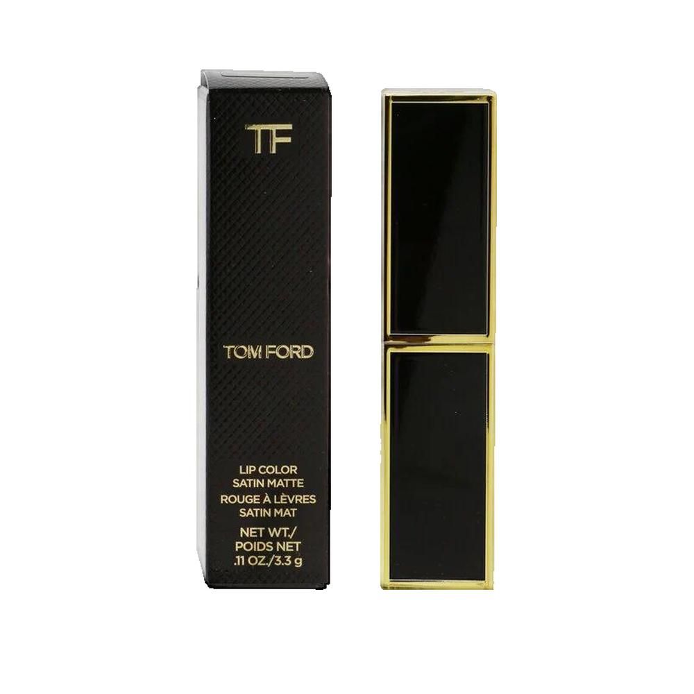 Zwarte lippenstiftverpakking met gouden rand en logo. Daarnaast een geopende lippenstift met gouden behuizing.