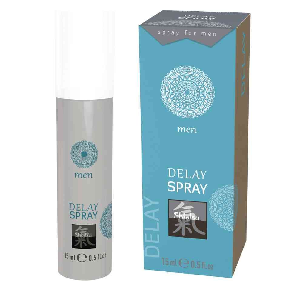Flacon pulvérisateur gris et emballage turquoise. Inscription: men, Delay Spray, Shiatsu. Volume: 15 ml / 0.5 fl.oz.