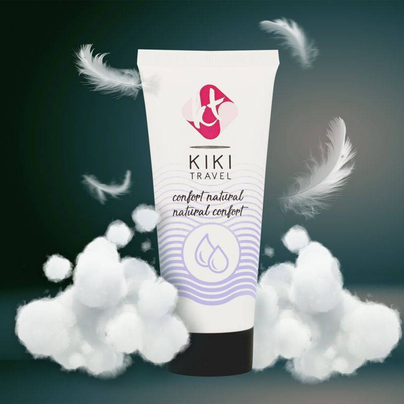 Tube de gel lubrifiant Kiki Travel entouré de plumes et de coton.