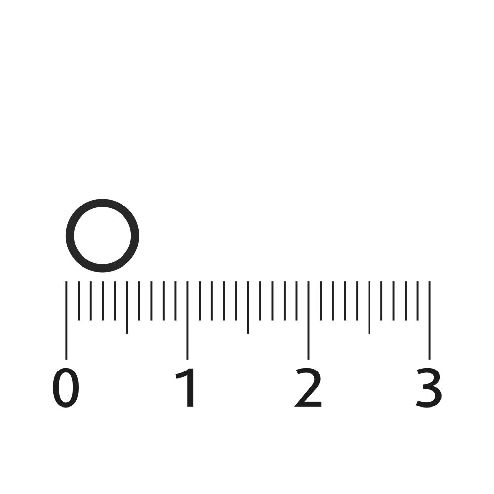 Cirkelvormige tablet naast een liniaal. Zwarte cirkel, witte achtergrond.