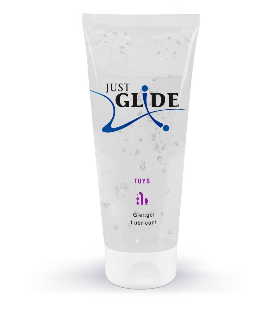 Tube met glijmiddel. Opschrift: JUST GLIDE, TOYS, Gleitgel, Lubricant. Transparante gel zichtbaar.