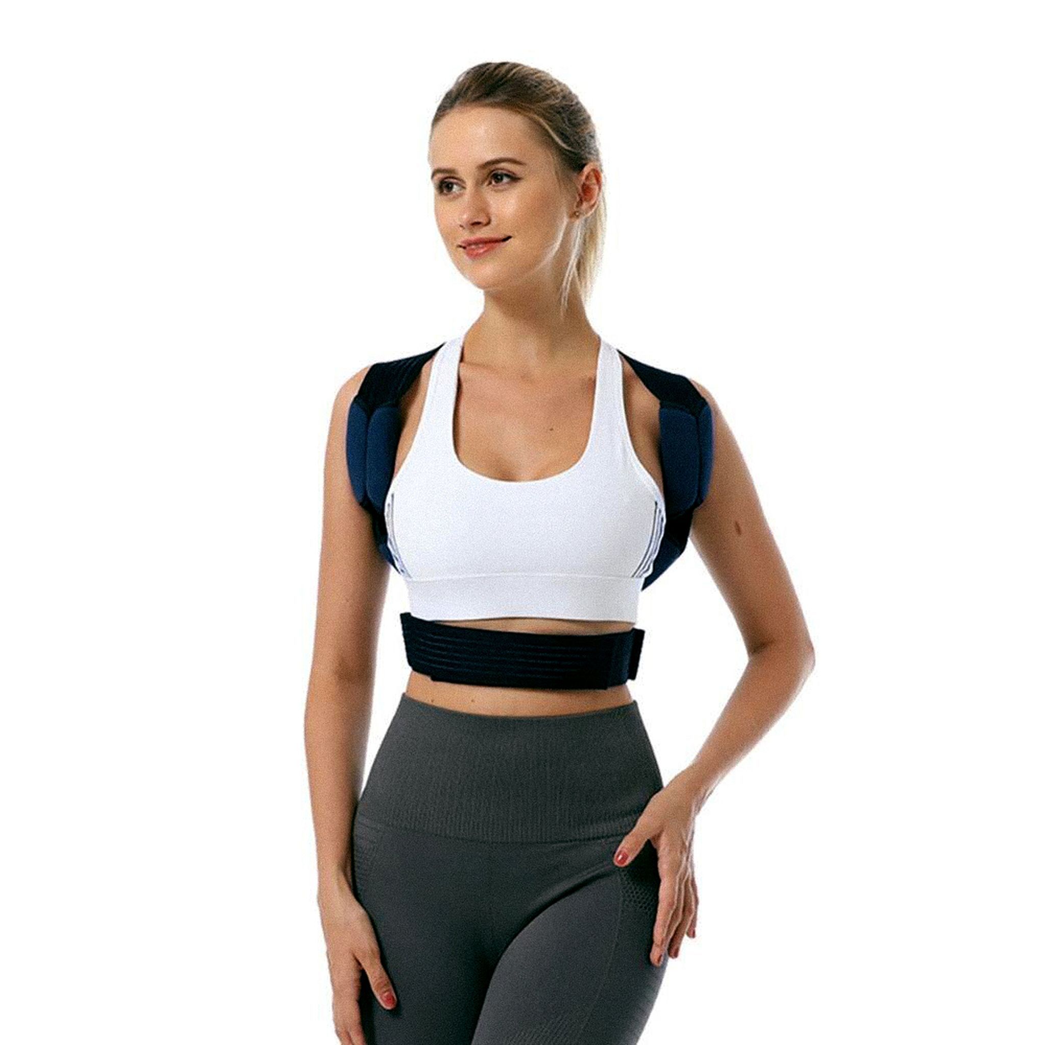 Correcteur de posture noir porté par une femme. Bretelles et ceinture thoracique. Taille XL.