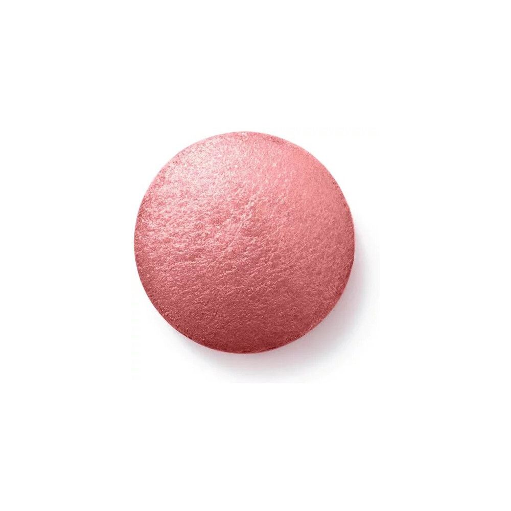 Blush rond rose. Surface lisse. Sur fond blanc.