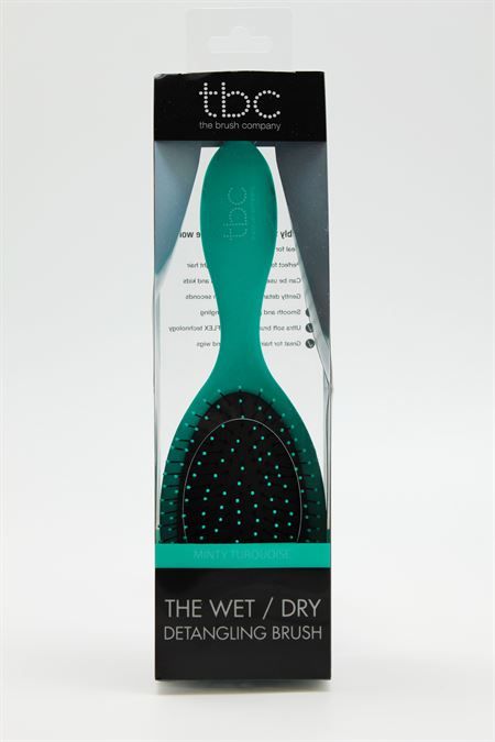 Brosse TBC Wet & Dry couleur menthe turquoise, emballée dans un étui transparent.