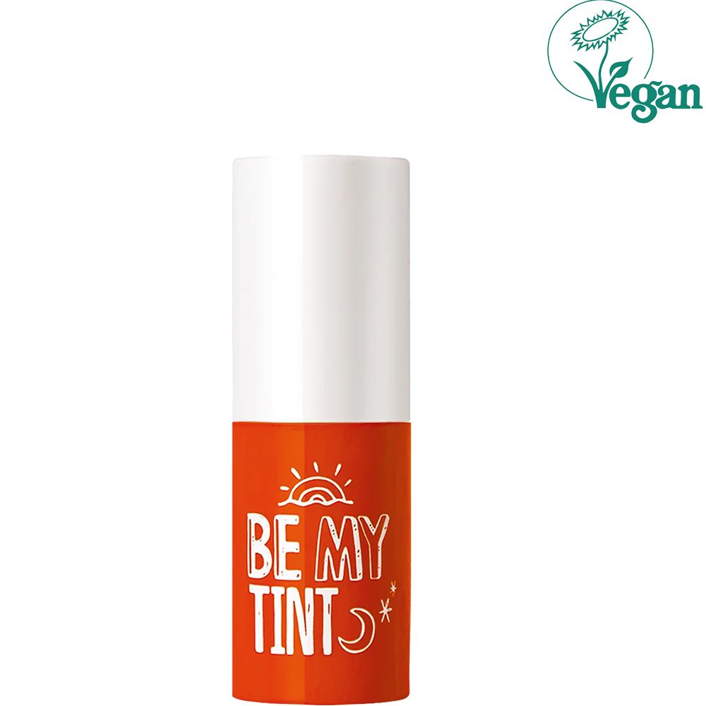 Teinte à lèvres orange et blanche. Inscription: BE MY TINT. Logo vegan.