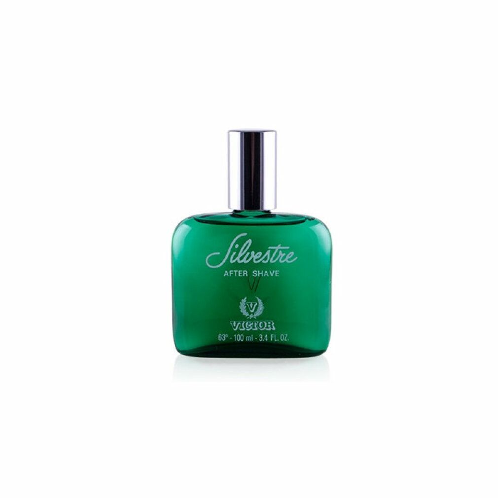Groene fles met zilveren dop. Opschrift: Silvestre After Shave. Logo: Victor. Vierkante vorm.
