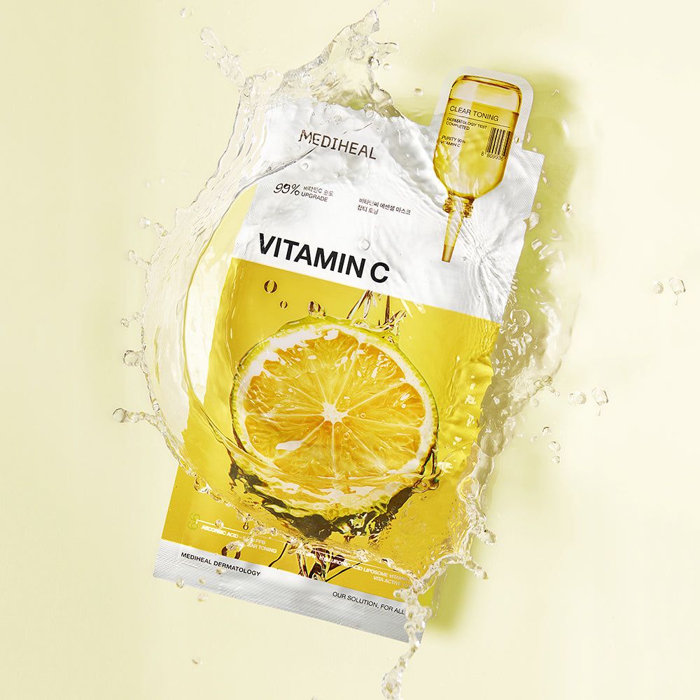 Emballage du masque en tissu MEDIHEAL Vitamin C avec citron et eau. Emballage jaune avec ampoule doseuse.