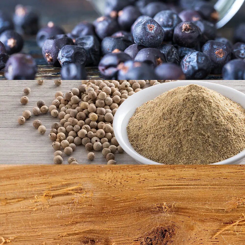 Gros plan de baies de genièvre, grains de poivre et poudre dans un bol. Morceau de bois en arrière-plan.