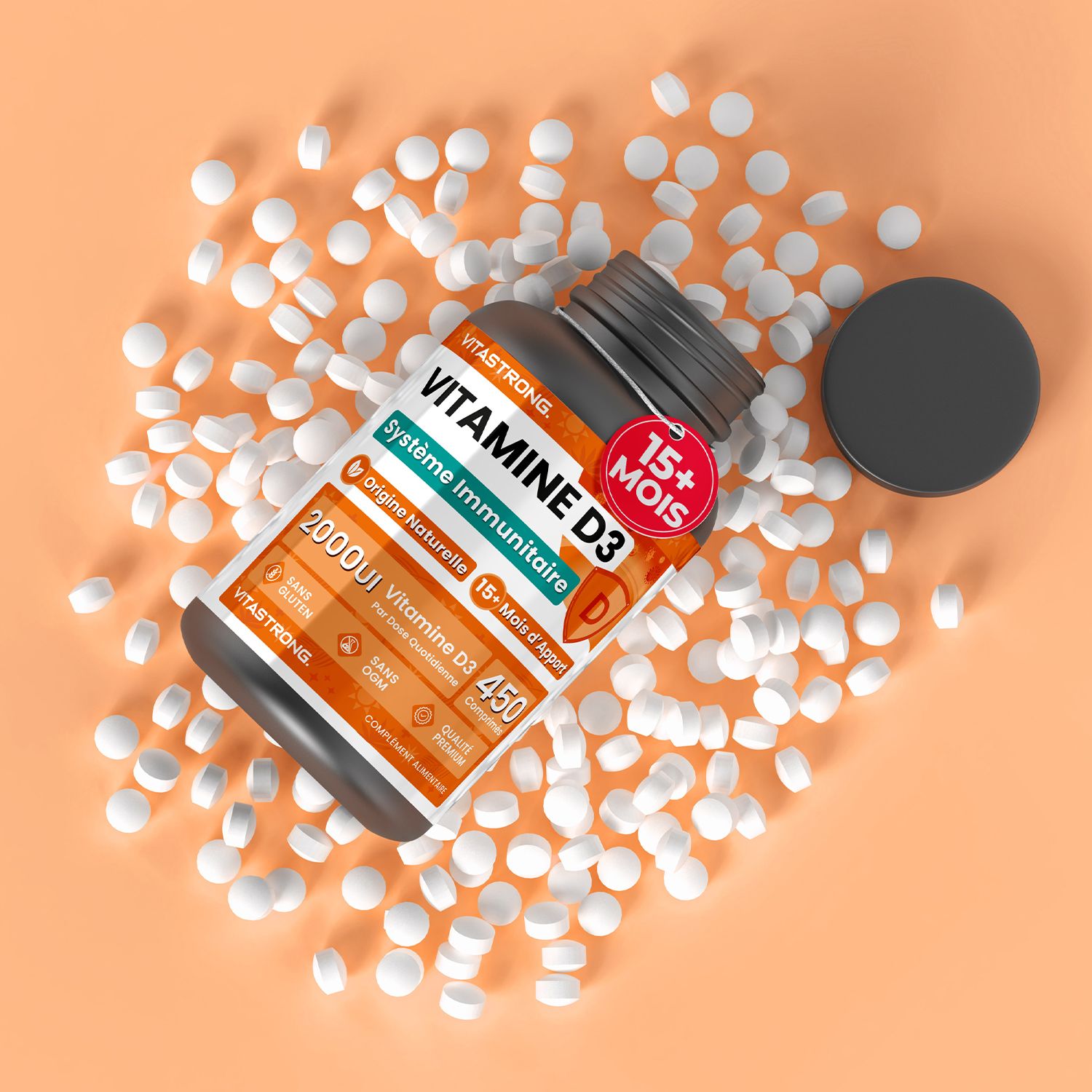Vitamine D3-fles en tabletten op oranje achtergrond. 450 tabletten.