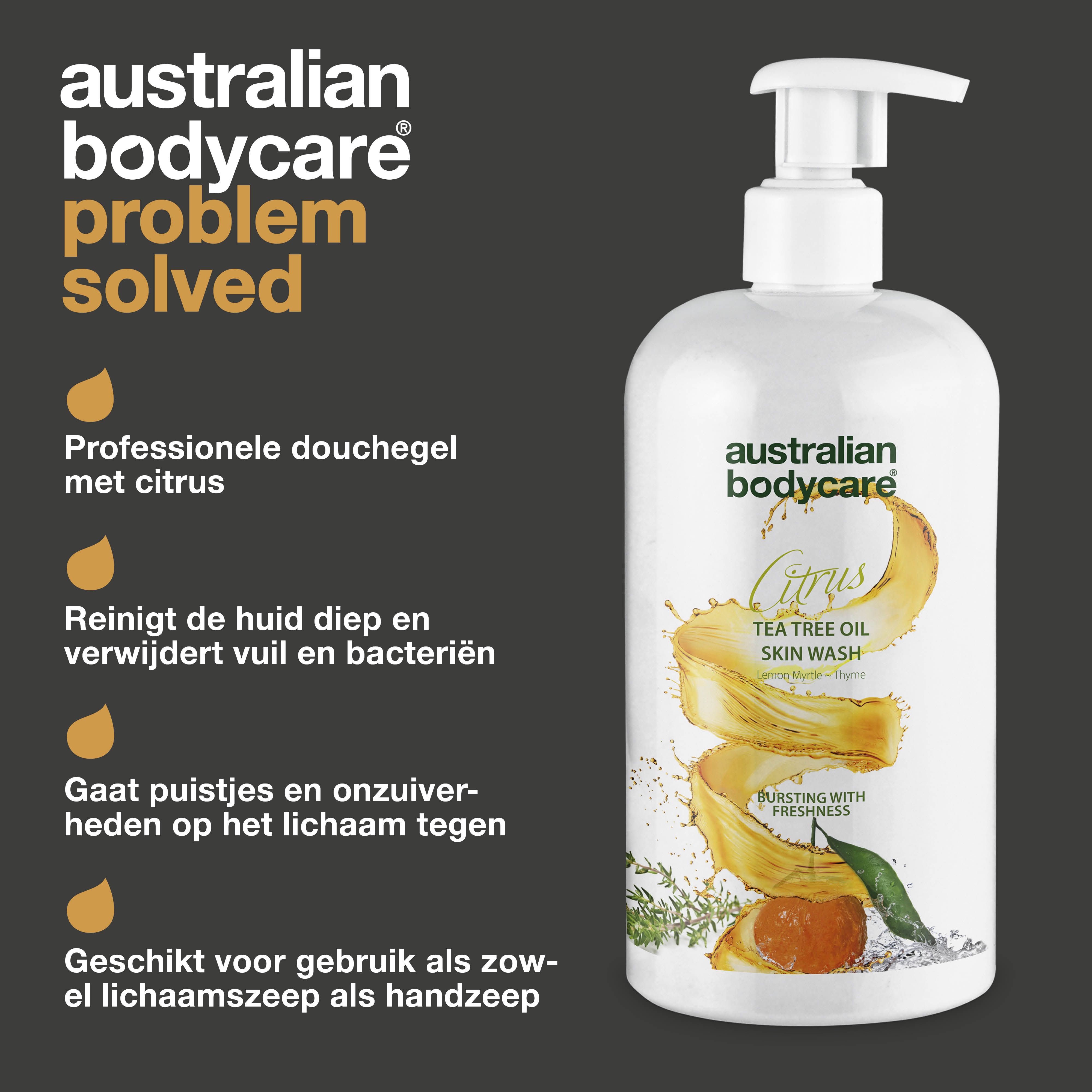 Fles met pomp. Tekst: Australian Bodycare Citrus Tea Tree Oil Skin Wash. Gele druppels.