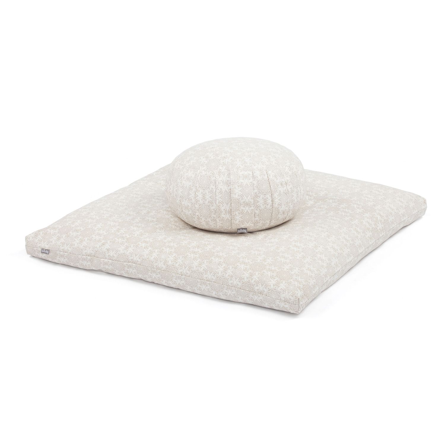 Zafu en meditatiemat. Crème met mandala-patroon. Zafu rond, mat rechthoekig.