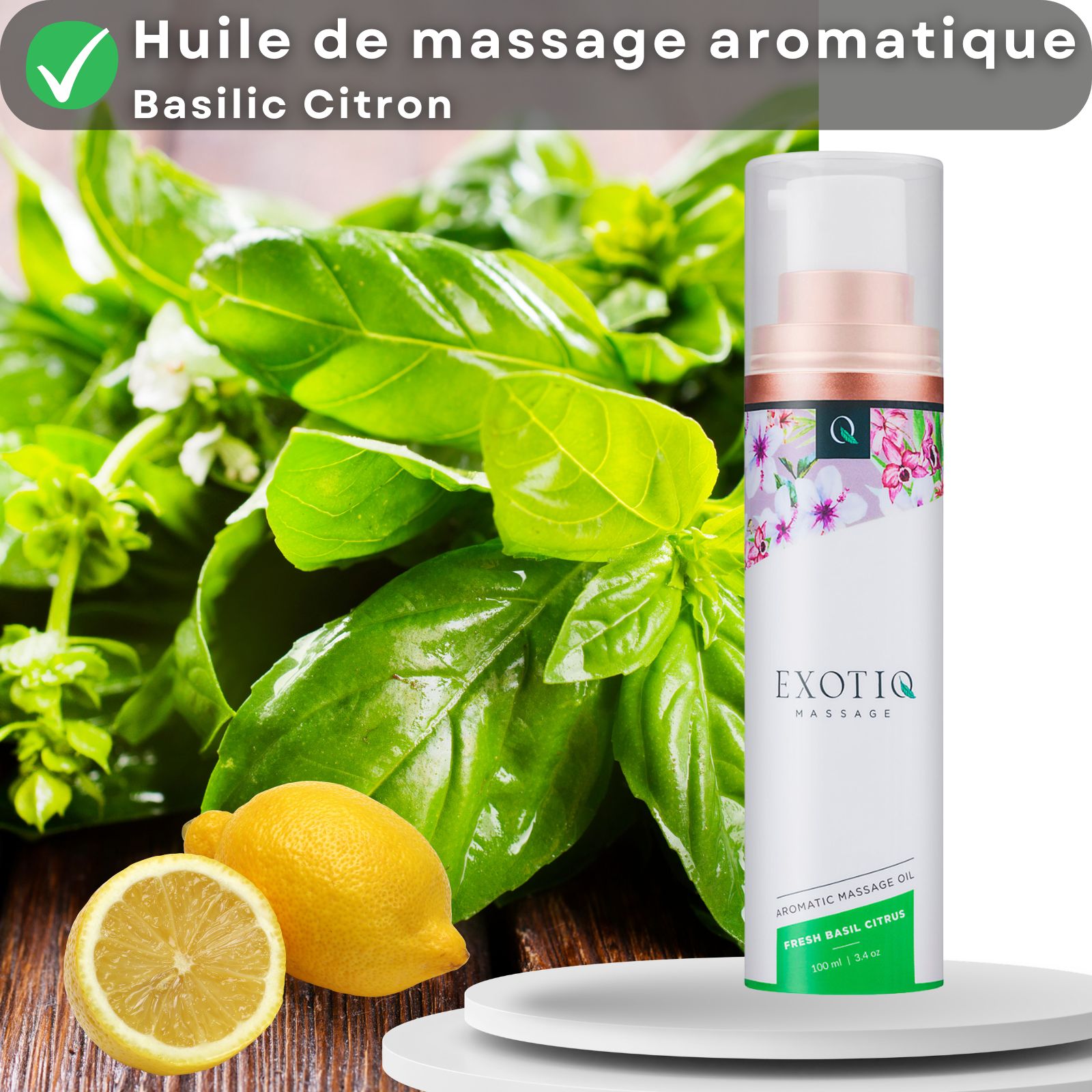 Flacon d'huile de massage à côté de basilic, citron. Texte: Huile de massage aromatique Basilic Citron.