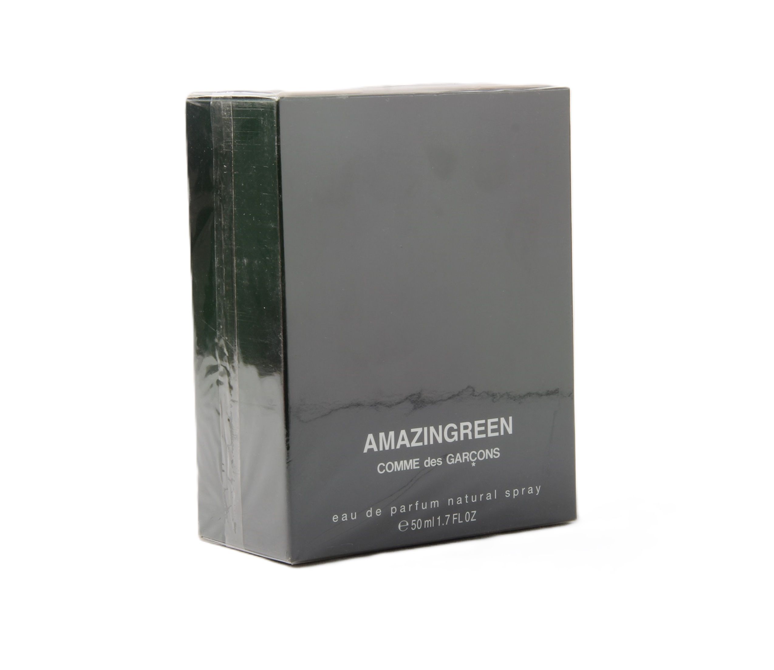 Zwarte doos, verpakt. Opschrift: AMAZINGREEN, COMME des GARÇONS, eau de parfum natural spray.