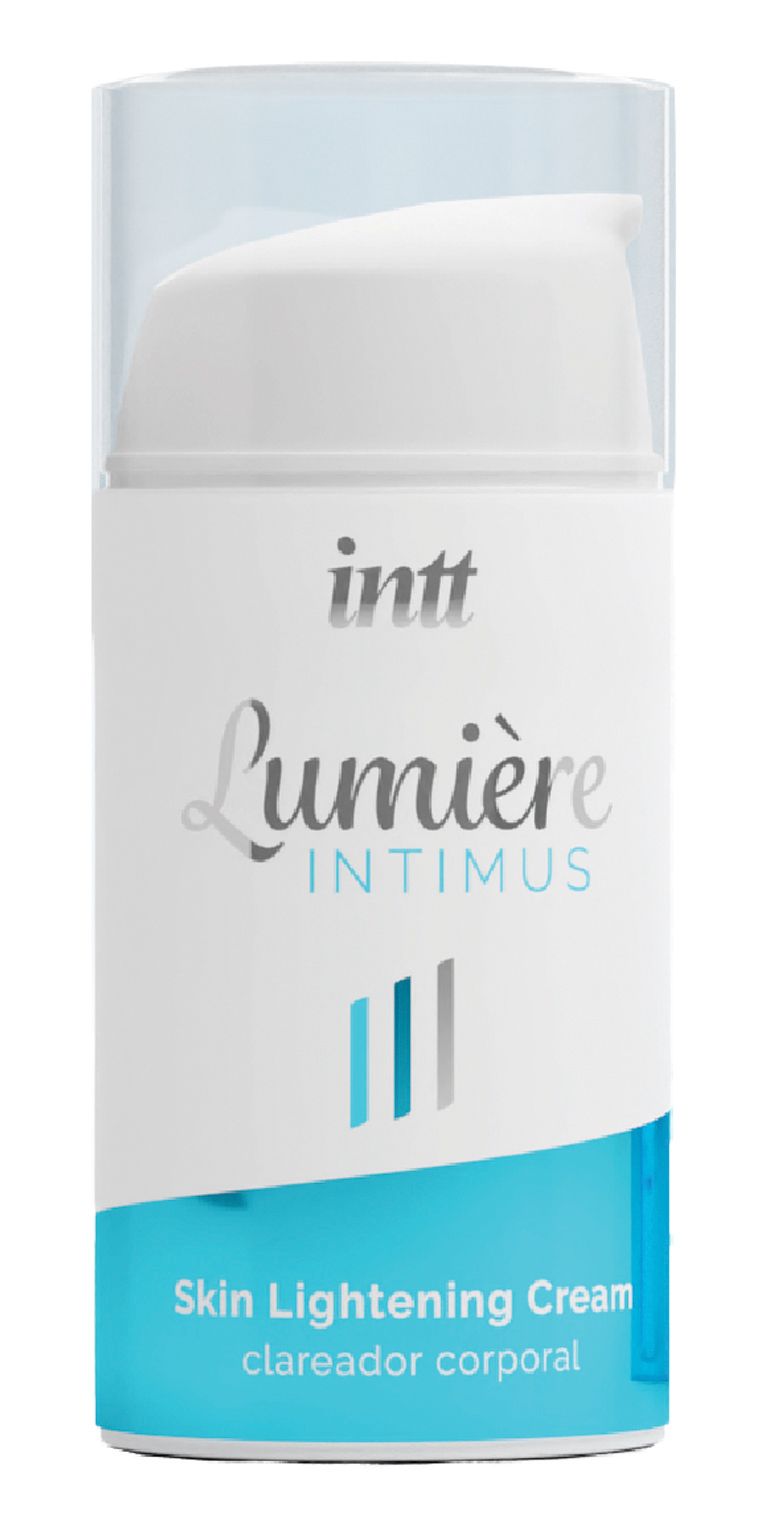 Cilindrische fles met pomp. Opschrift: intt, Lumière Intimus, Skin Lightening Cream. Kleuren: turquoise en wit.