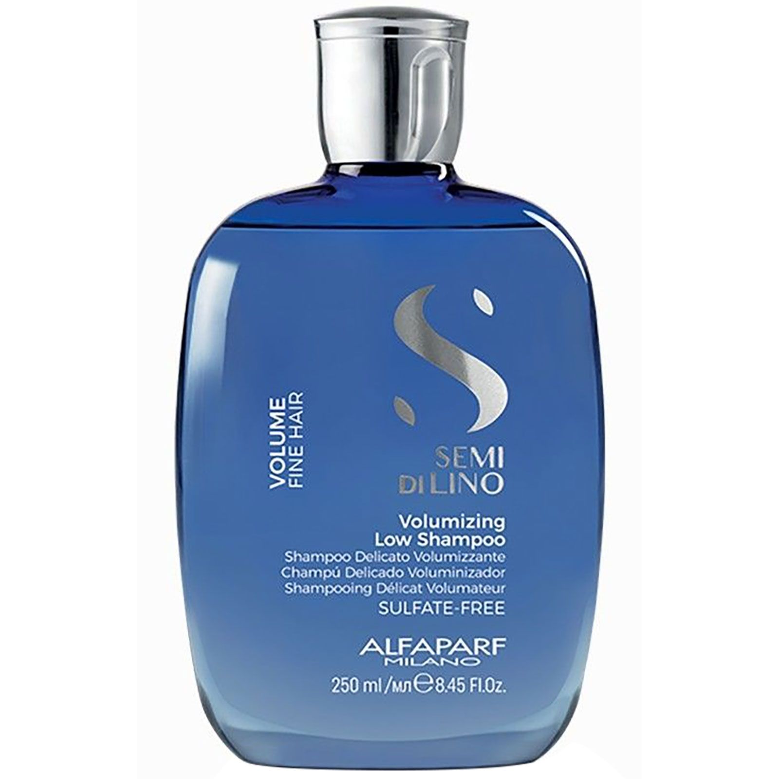 Blauwe flacon met zilveren dop, bevat Semi Di Lino Volume Volumizing Low Shampoo.