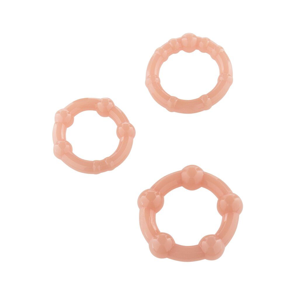 Drie roze jelly penisringen in verschillende maten met nopjes.