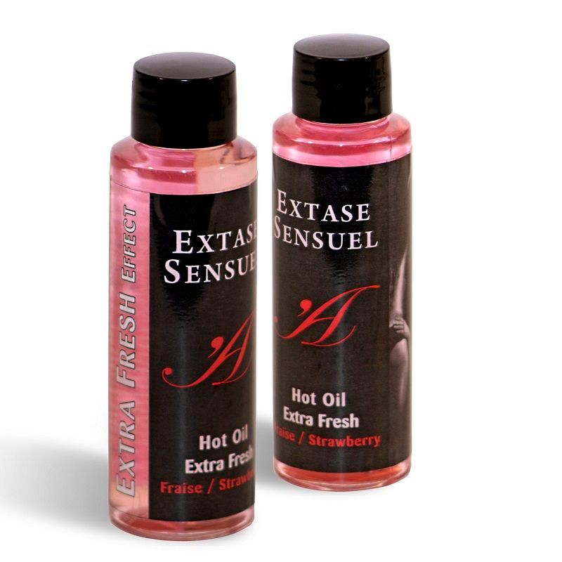 Deux bouteilles d'Extase Sensuel Huile Chaude Extra Fraîche Fraise.