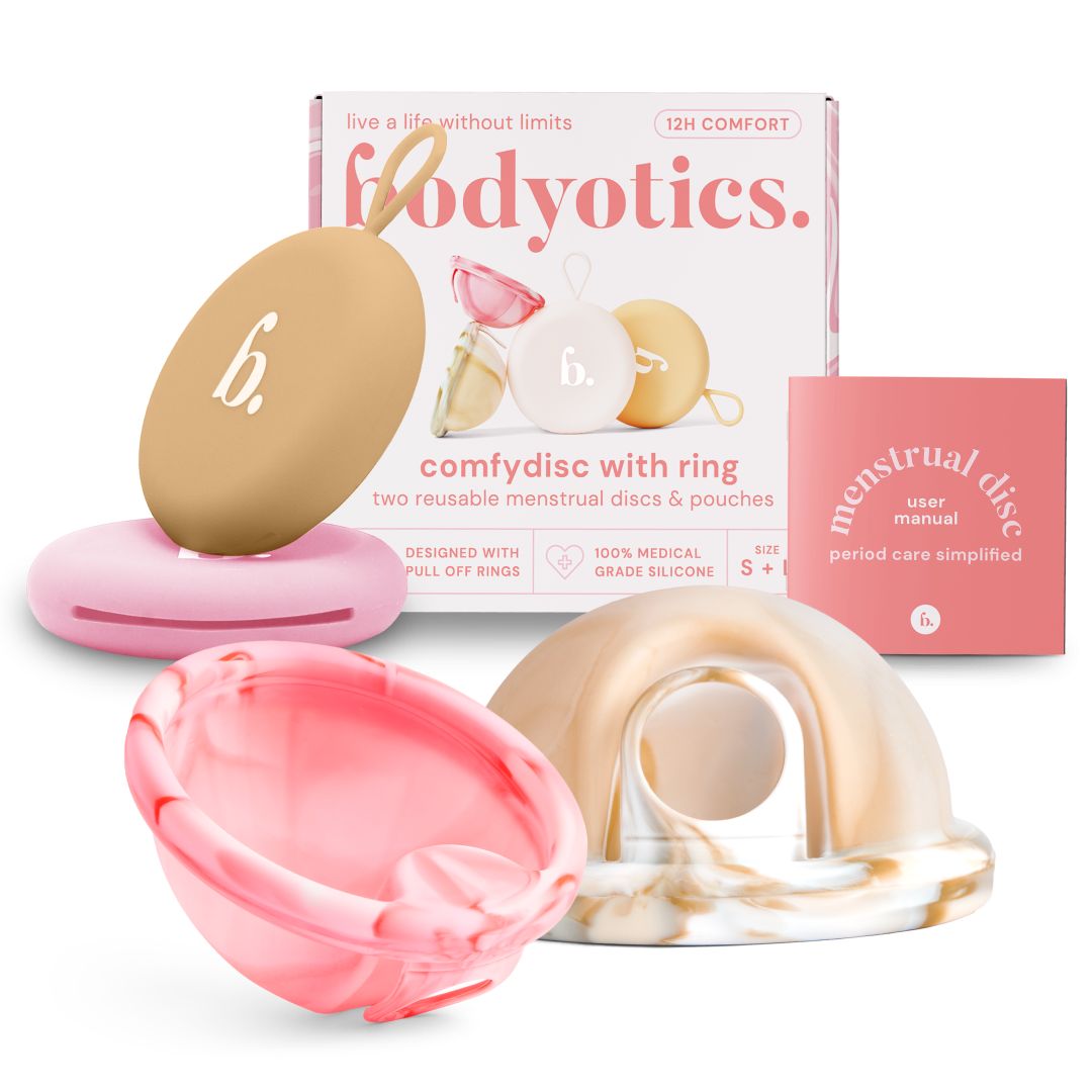Bodyotics Comfydisc set met twee herbruikbare menstruatiediscs en zakjes van medische siliconen.