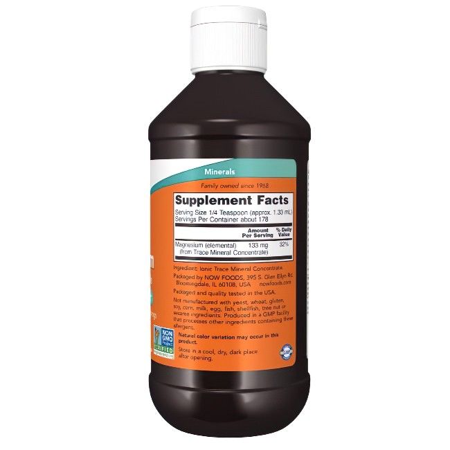 Liquide brun en bouteille à bouchon blanc. Étiquette avec informations nutritionnelles et ingrédients. Inscription : "Minerals".
