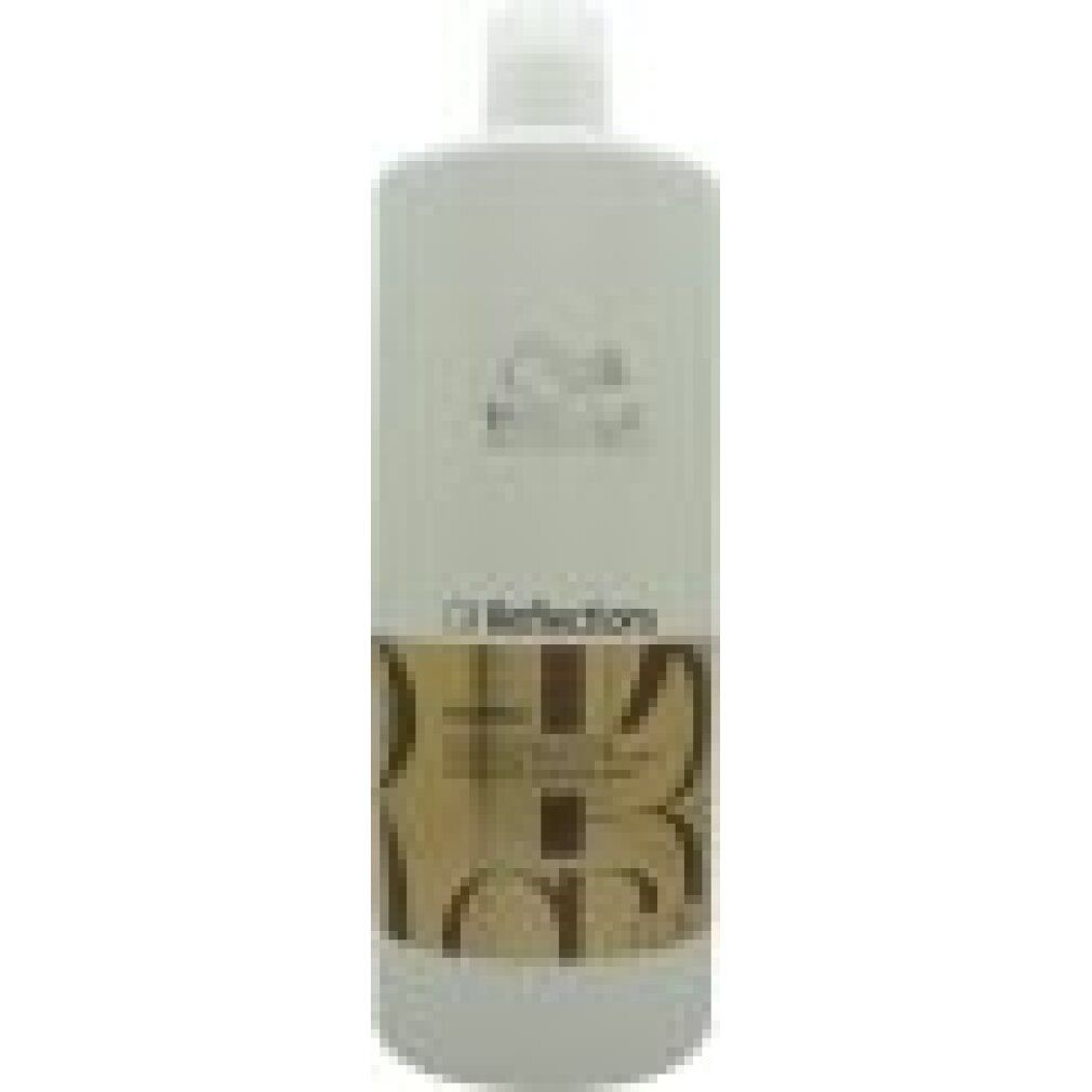 Witte shampoo fles met etiket. Opschrift: Wella, Oil Reflections, Shampoo.