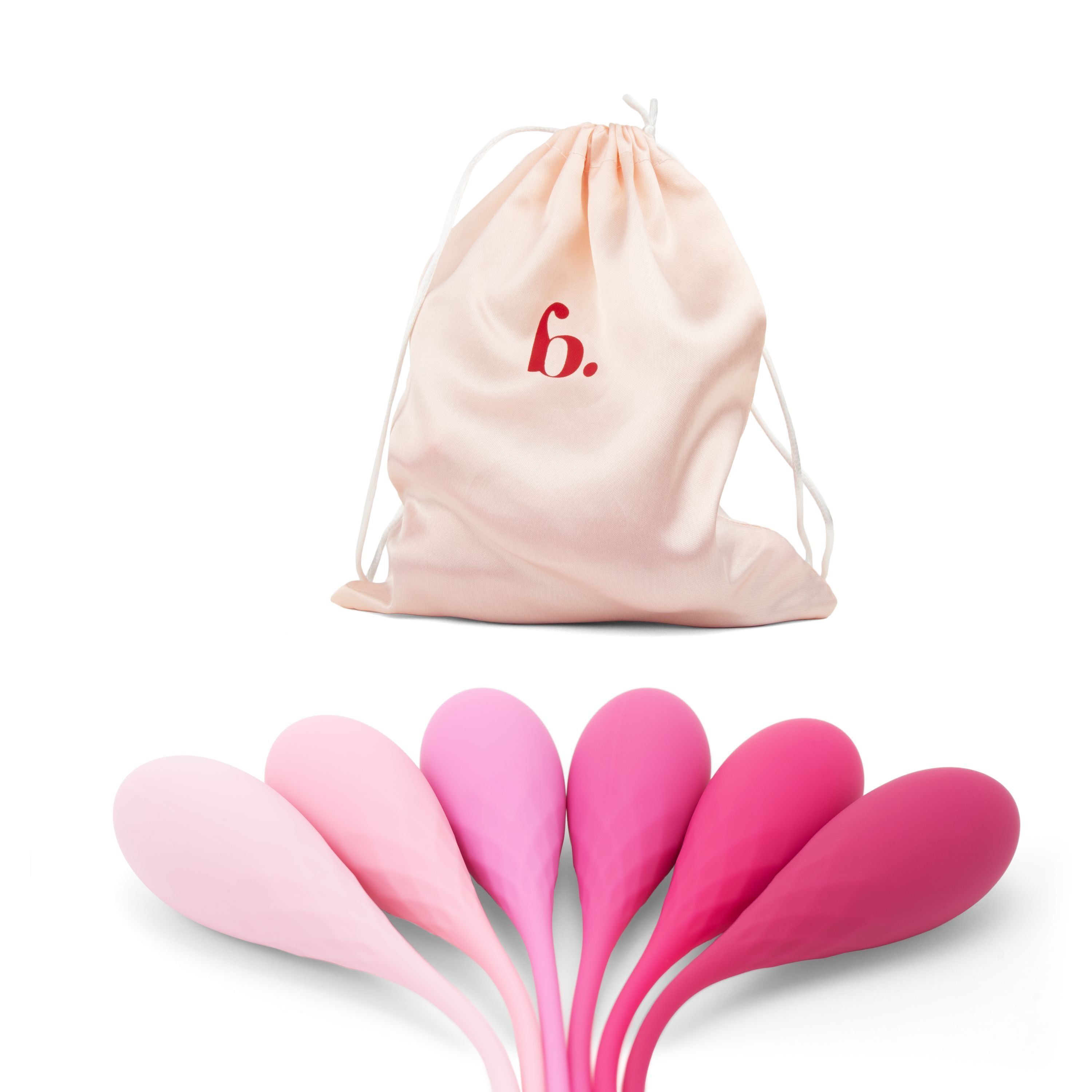 Set van zes Kegelgewichten in verschillende roze tinten. Zakje met rood logo 'b.'