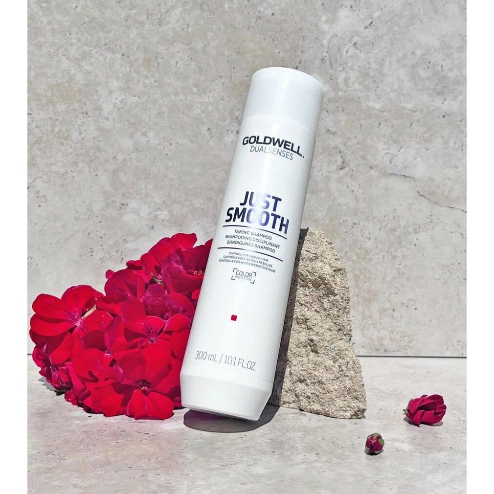 Bouteille de shampooing Goldwell Just Smooth, 300ml. Bouteille blanche avec inscription noire.