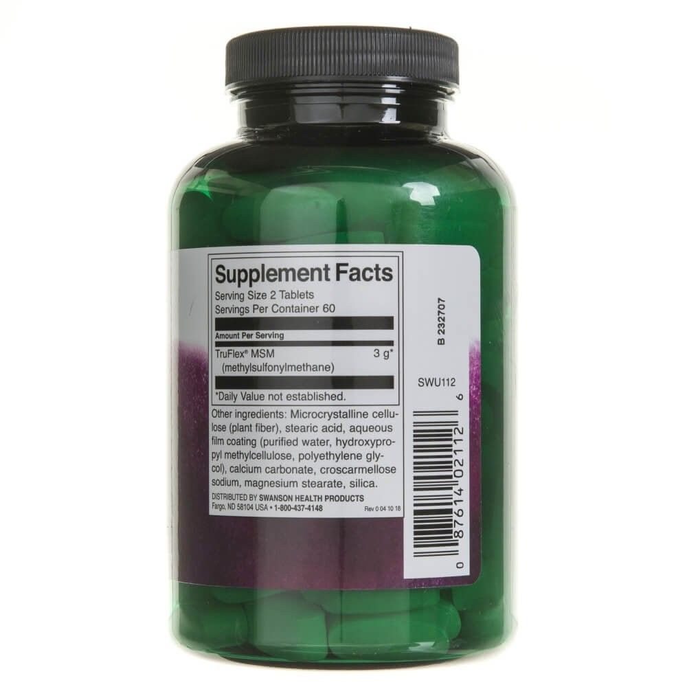 Groene fles met voedingssupplementen en een etiket met feiten.