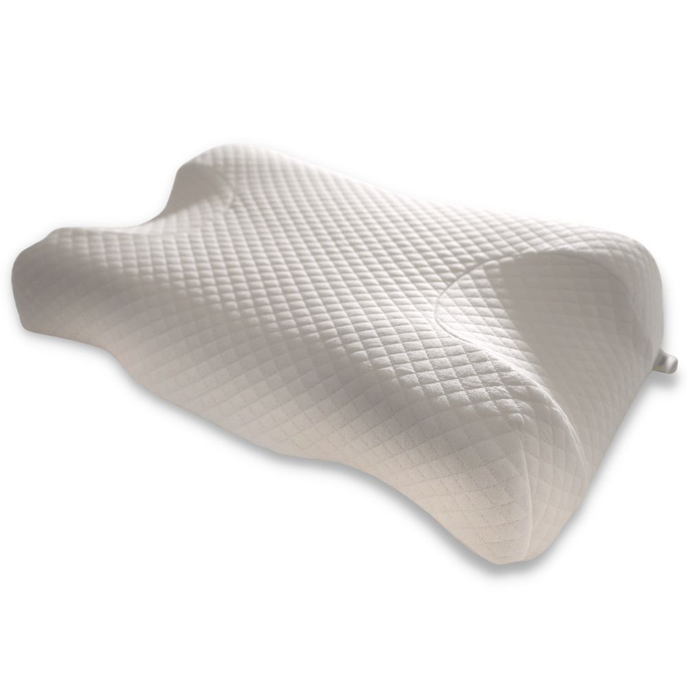 Oreiller blanc profilé. Motif quadrillé sur la surface. Conçu pour le sommeil.