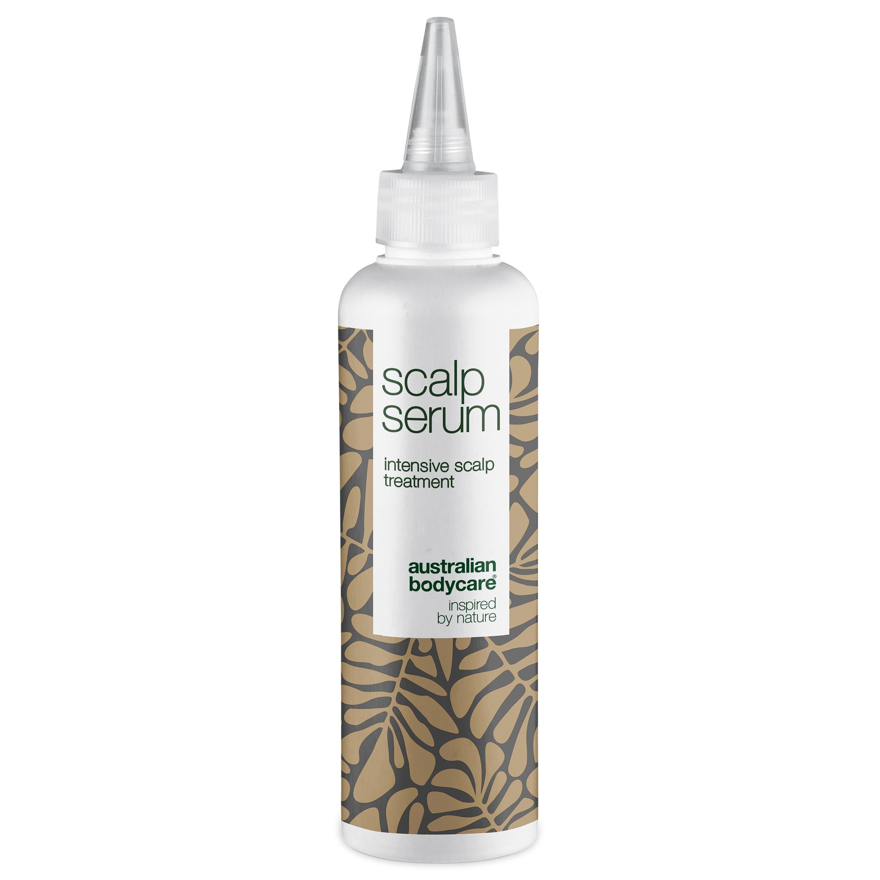 Flacon de sérum blanc avec applicateur. Inscription : Scalp Serum, Intensive Scalp Treatment. Marque : Australian Bodycare.