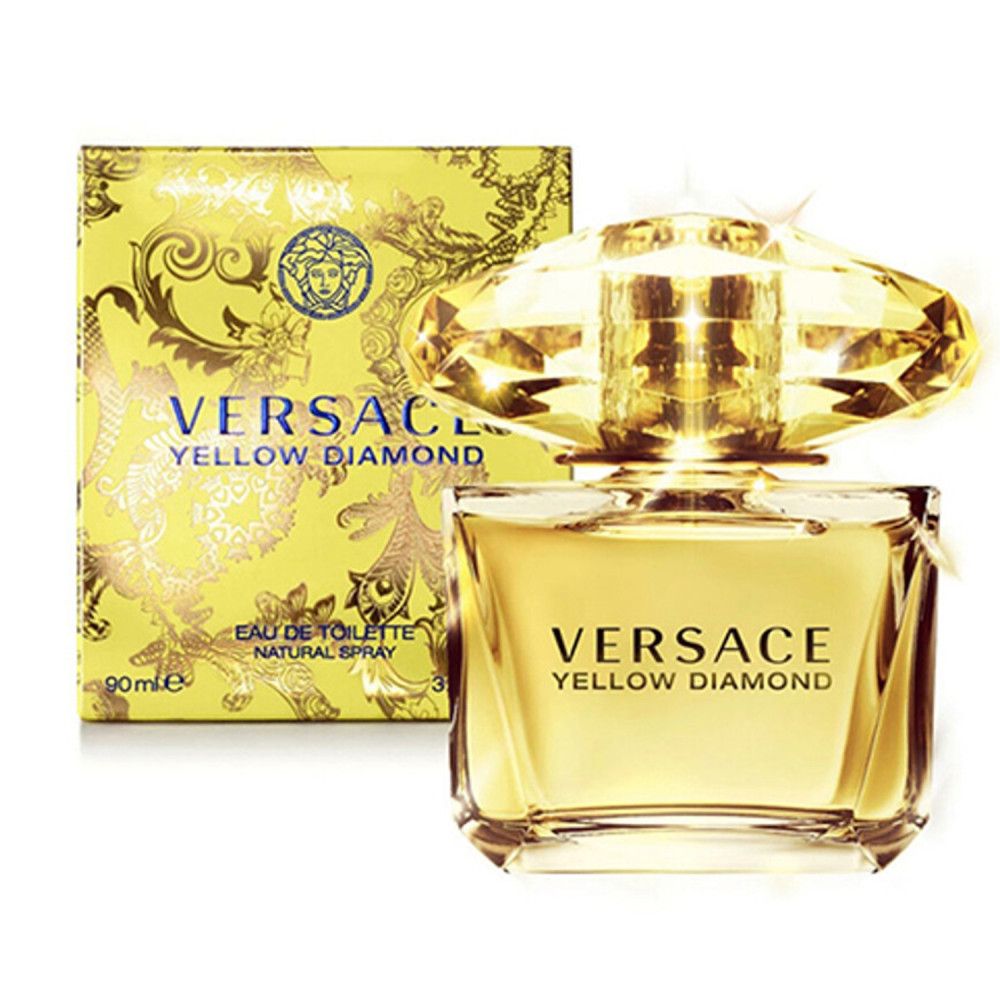 Flacon et boîte de parfum jaune. Inscription : Versace Yellow Diamond. Flacon avec bouchon jaune.