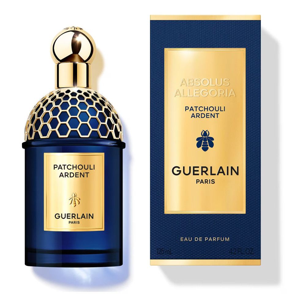 Flacon bleu et boîte. Bouchon et étiquette dorés. Inscription: Patchouli Ardent, Guerlain Paris. Logo abeille.