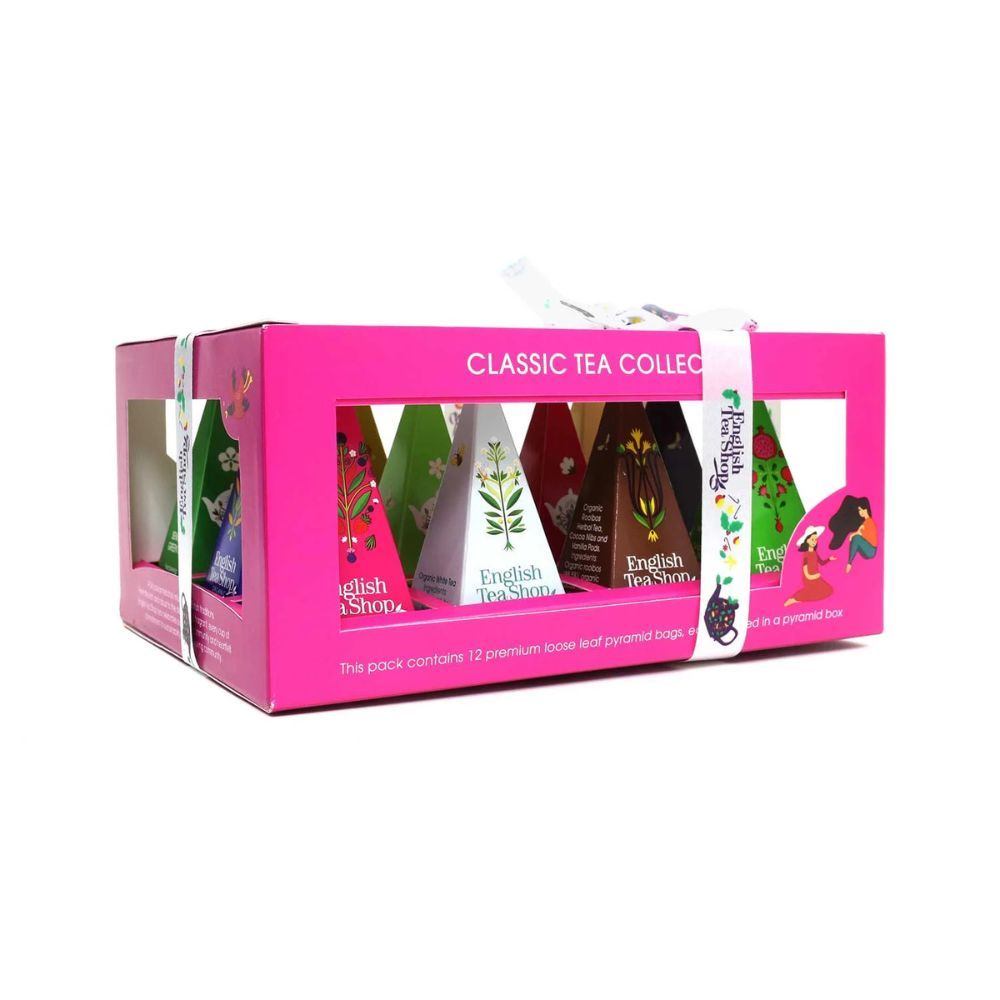 Roze geschenkdoos met theezakjes. Opschrift: Classic Tea Collection. Venster met theezakjes in piramidevorm.