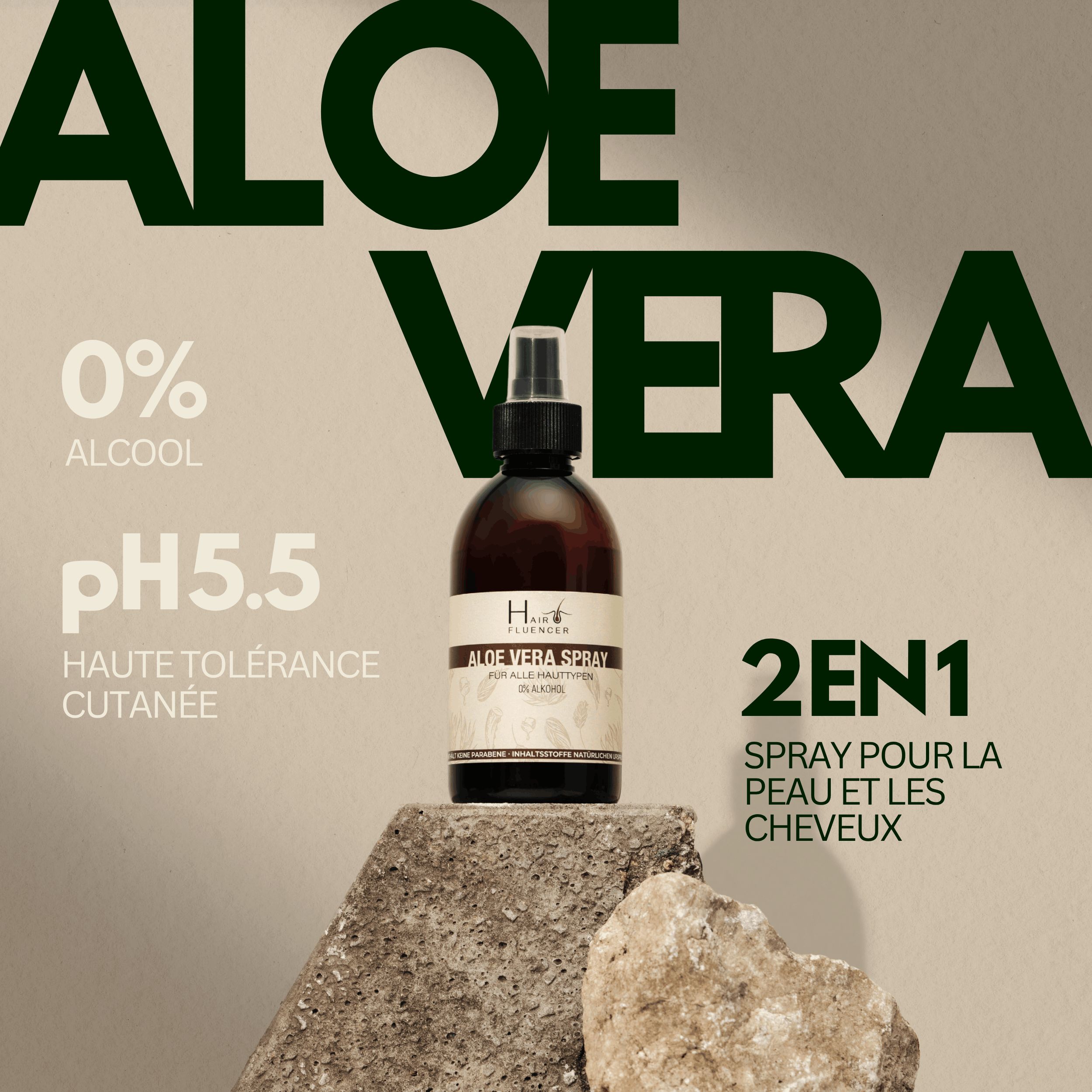 Flacon de spray Aloe Vera sur pierre. Texte: 0% alcool, pH 5.5, haute tolérance cutanée, spray 2 en 1 pour peau et cheveux.