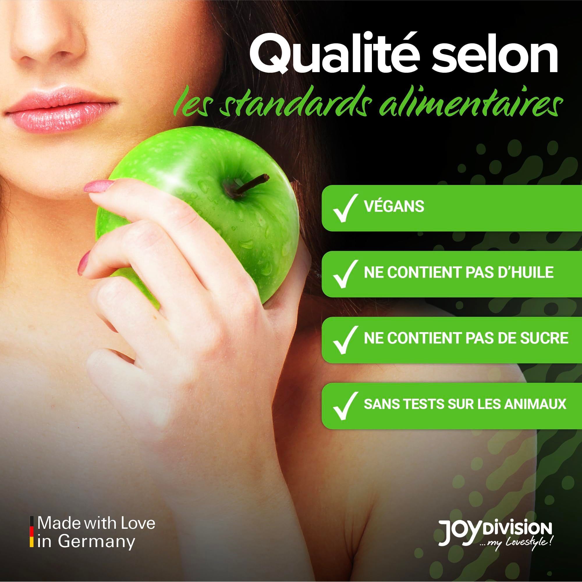 Bouteille d'huile de massage verte, motif pommes.