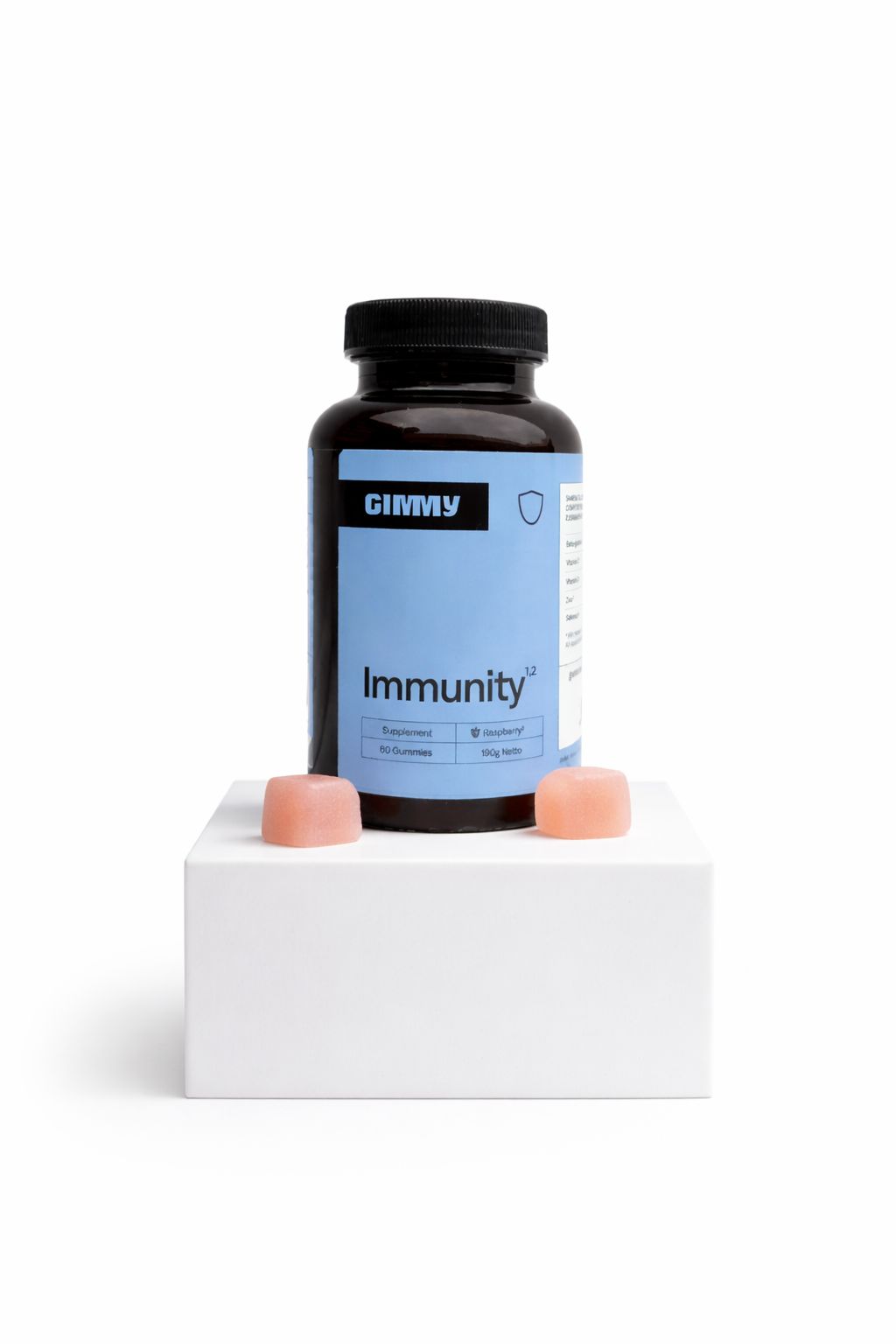 GIMMY Immunity fles, twee roze gummies op wit voetstuk. Blauw etiket met productnaam en schild.
