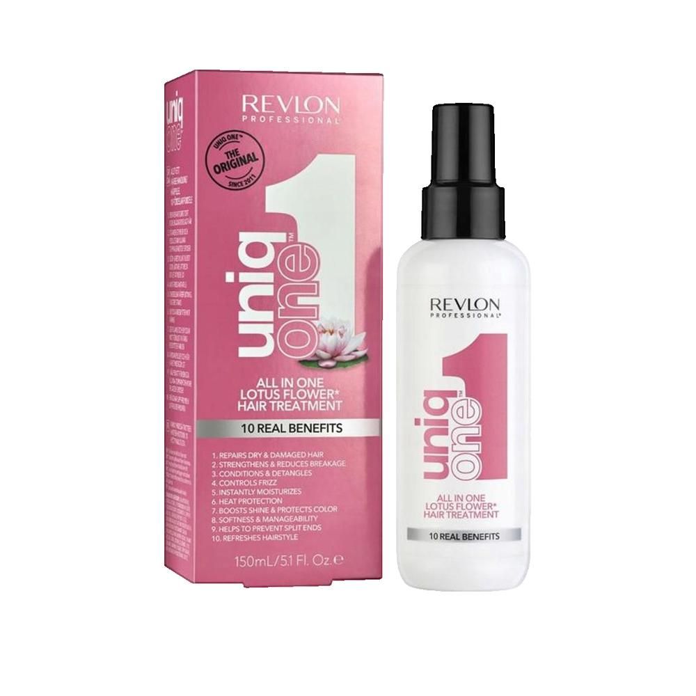 Emballage et flacon roses. Flacon blanc avec bouchon noir. Texte: Uniq One, All in One Lotus Flower Hair Treatment.